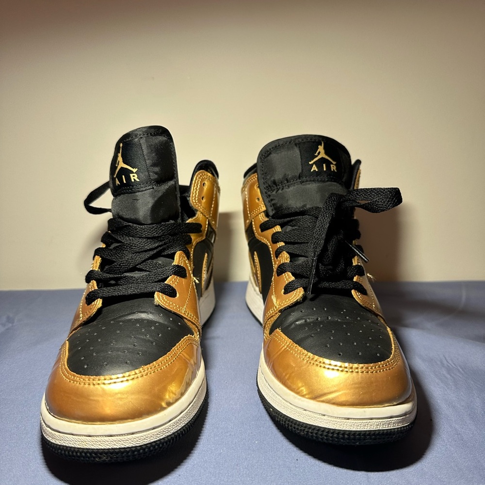 Jordan 1 Sneakers Black and Gold
